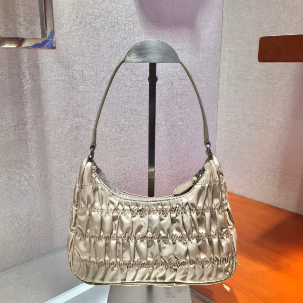 Pra*a nylon and saffiano leather mini bag