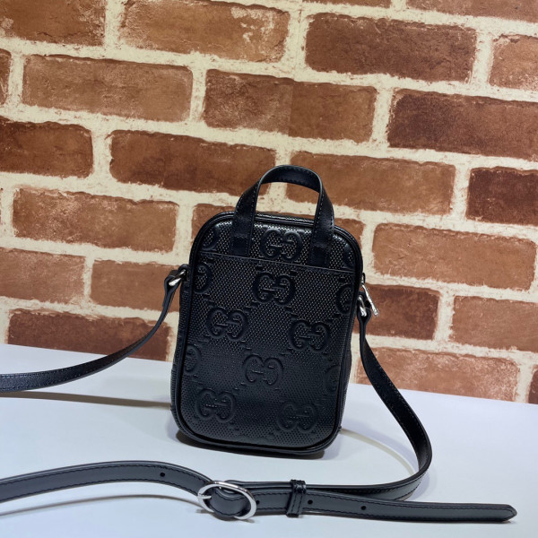 G*u*i gg embossed mini bag