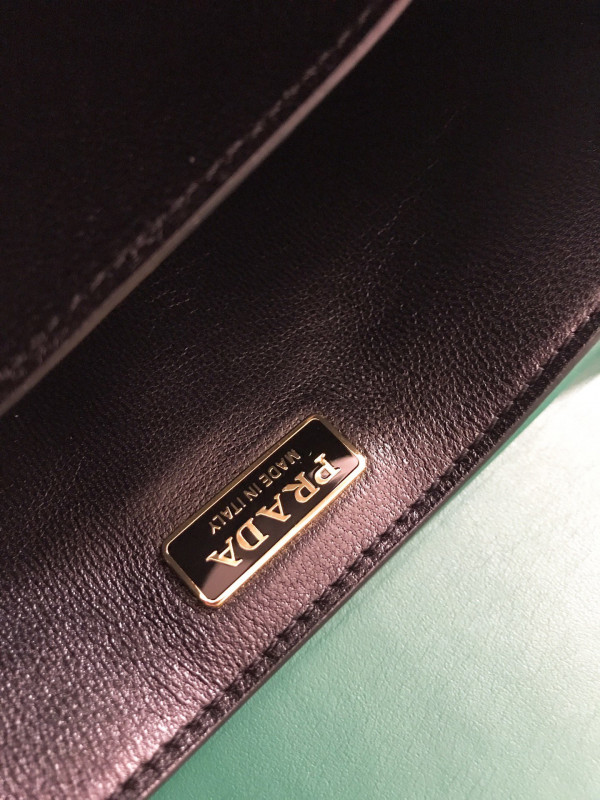 Pra*a cahier leather shoulder bag