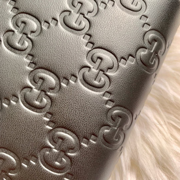G*u*i leather zip around wallet