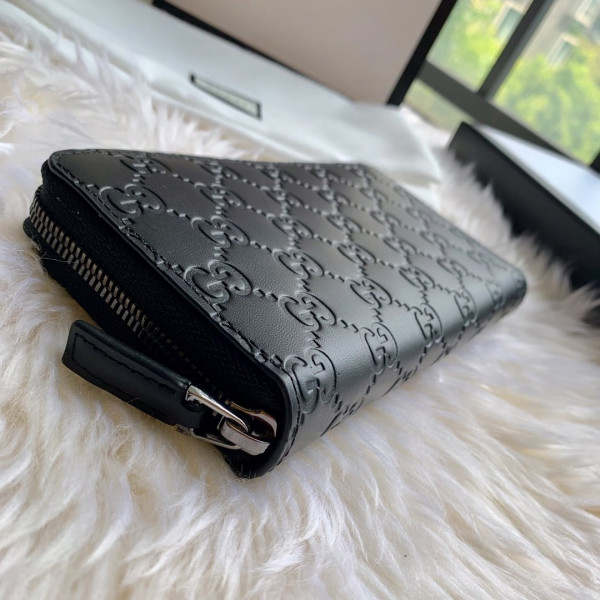 G*u*i leather zip around wallet
