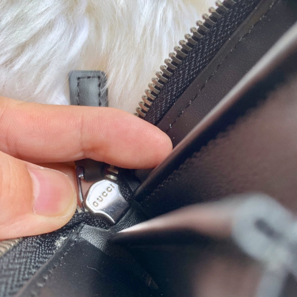 G*u*i leather zip around wallet