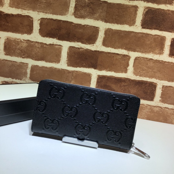 G*u*i gg embossed zippy wallet