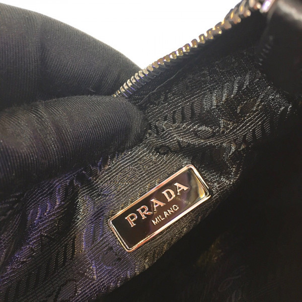 Pra*a nylon and saffiano leather mini bag