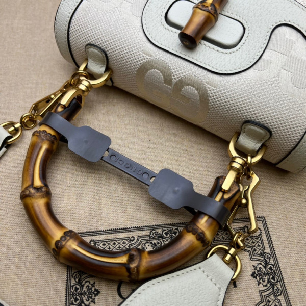 G*u*i small top handle bag with bamboo