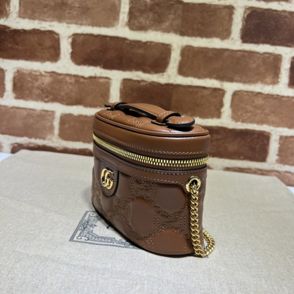 G*u*i gg matelassé top handle mini bag