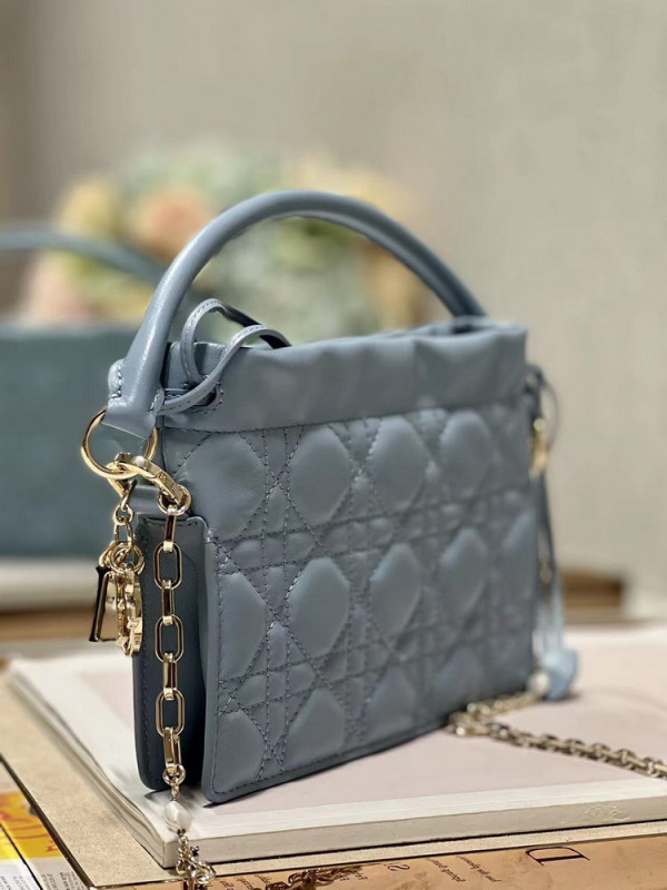lady D*or top handle drawstring mini bag