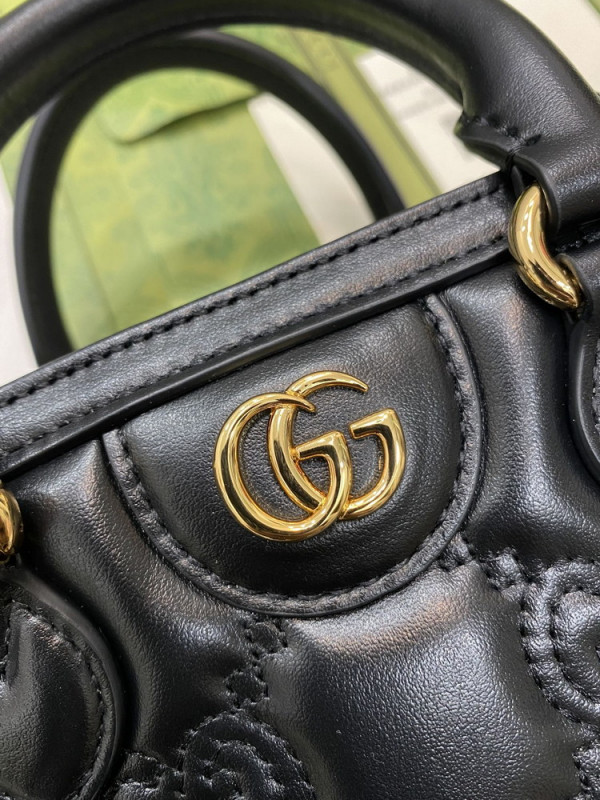G*u*i gg matelassé mini top handle bag