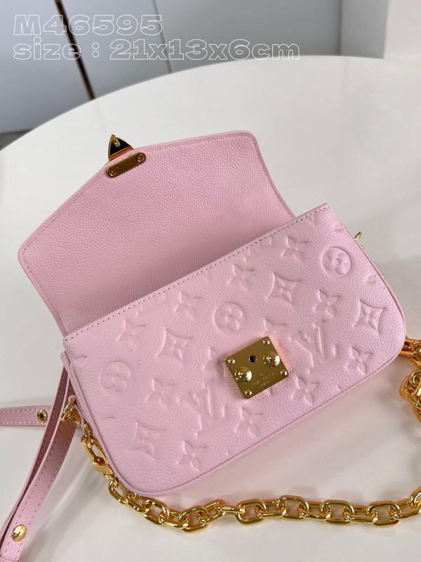 l**is V*t*n pochette metis east west